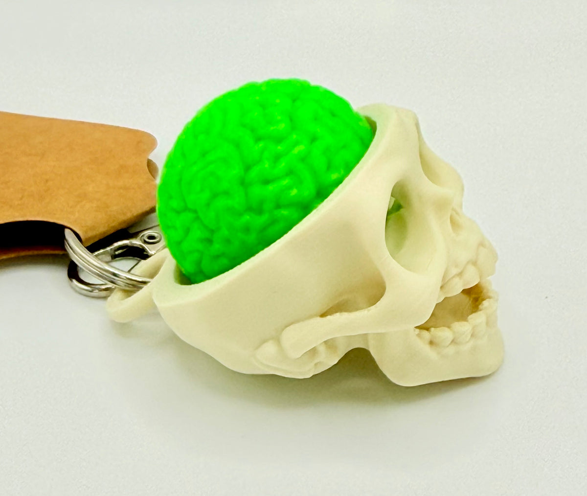 GlowBrain Skull Fidget Clicker Keychain – Green Brain, Glow